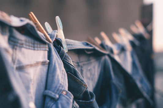 jeans hanging from a washing line