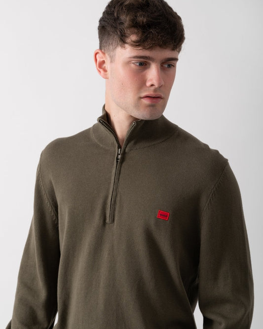 Man wears Hugo cardigan