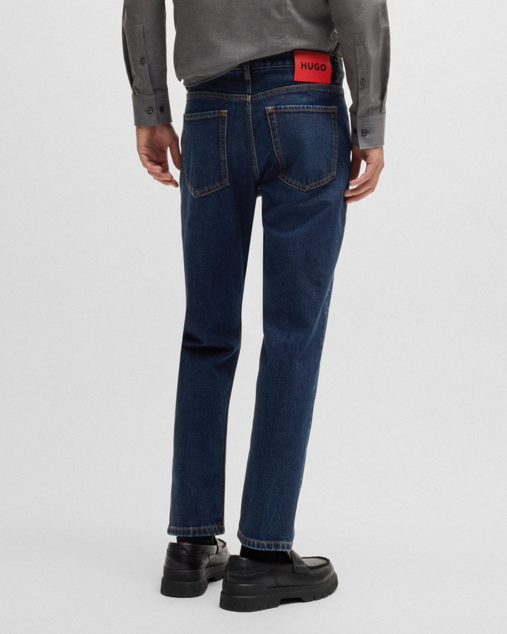 HUGO HUGO 634 Mens Tapered-Fit Jeans in Dark-Blue Stretch Denim 