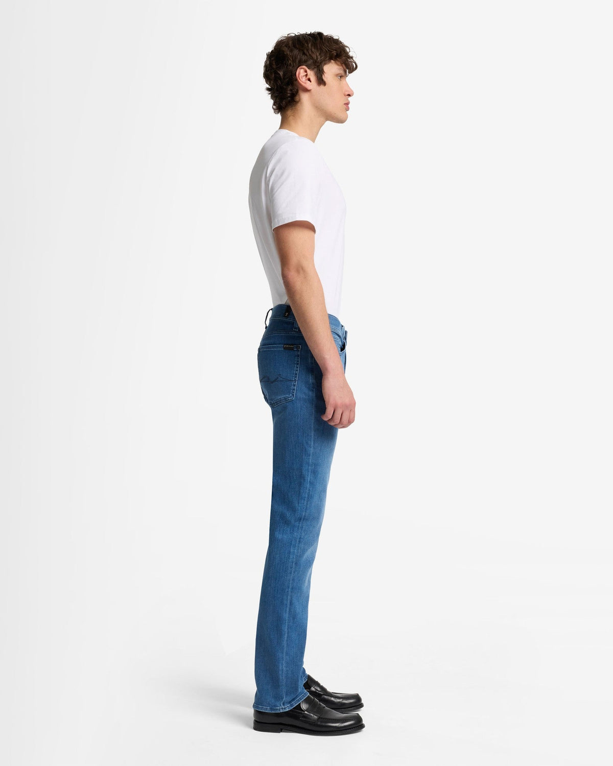 7 For All Mankind SLIMMY Mens Slim Fit Luxe Performance Eco Denim Jeans - Mid Blue full length side profile