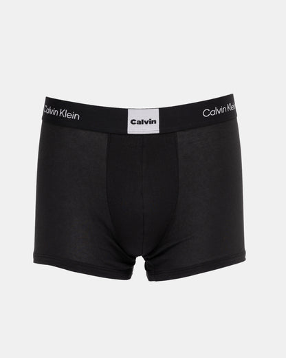Black Calvin Klein boxer briefs on a light gray background