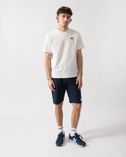 full length shot of a model wearing an Aquascutum Mens Badge T-Shirt in Old White