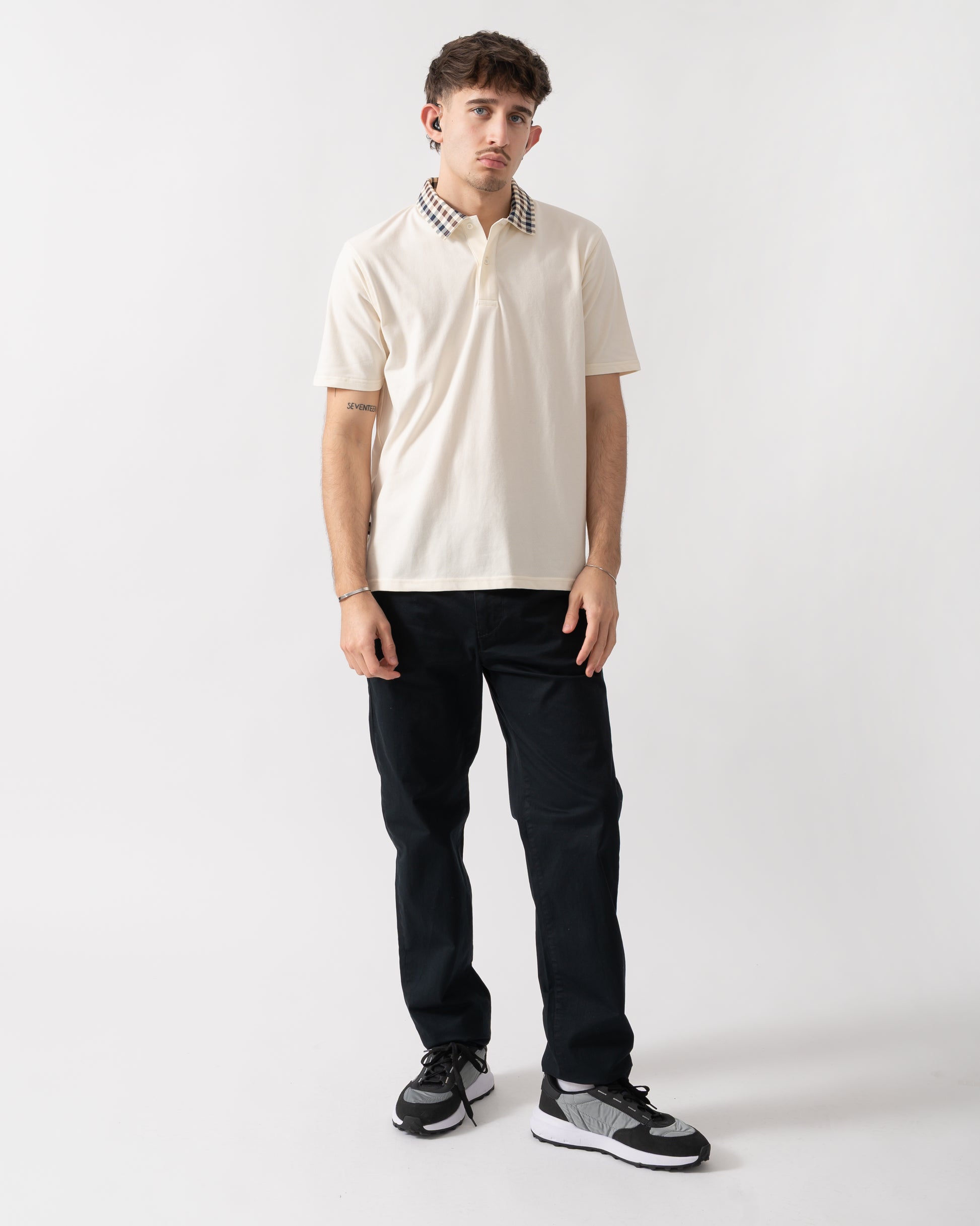 full length shot of model wearing an Aquascutum Mens Club Check Collar Polo Shirt in Old White 02