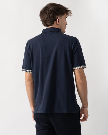 back shot of a model wearing an Aquascutum Mens Club Check Stretch Piquet Sleeves Polo Shirt in Navy 11