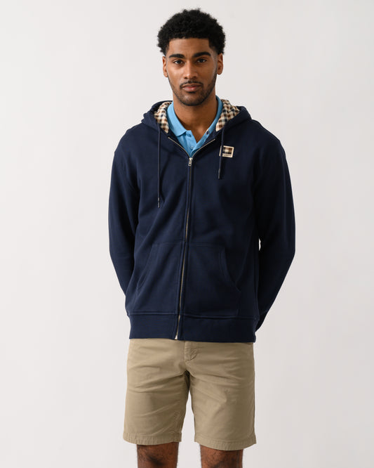 model wearing an Aquascutum Mens Full Zip Badge Hoodie in Navy
