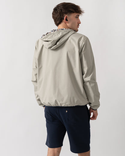 back shot of a model wearing an Aquascutum Mens RLG Badge Reversible Sailor Jacket in Salvia 34