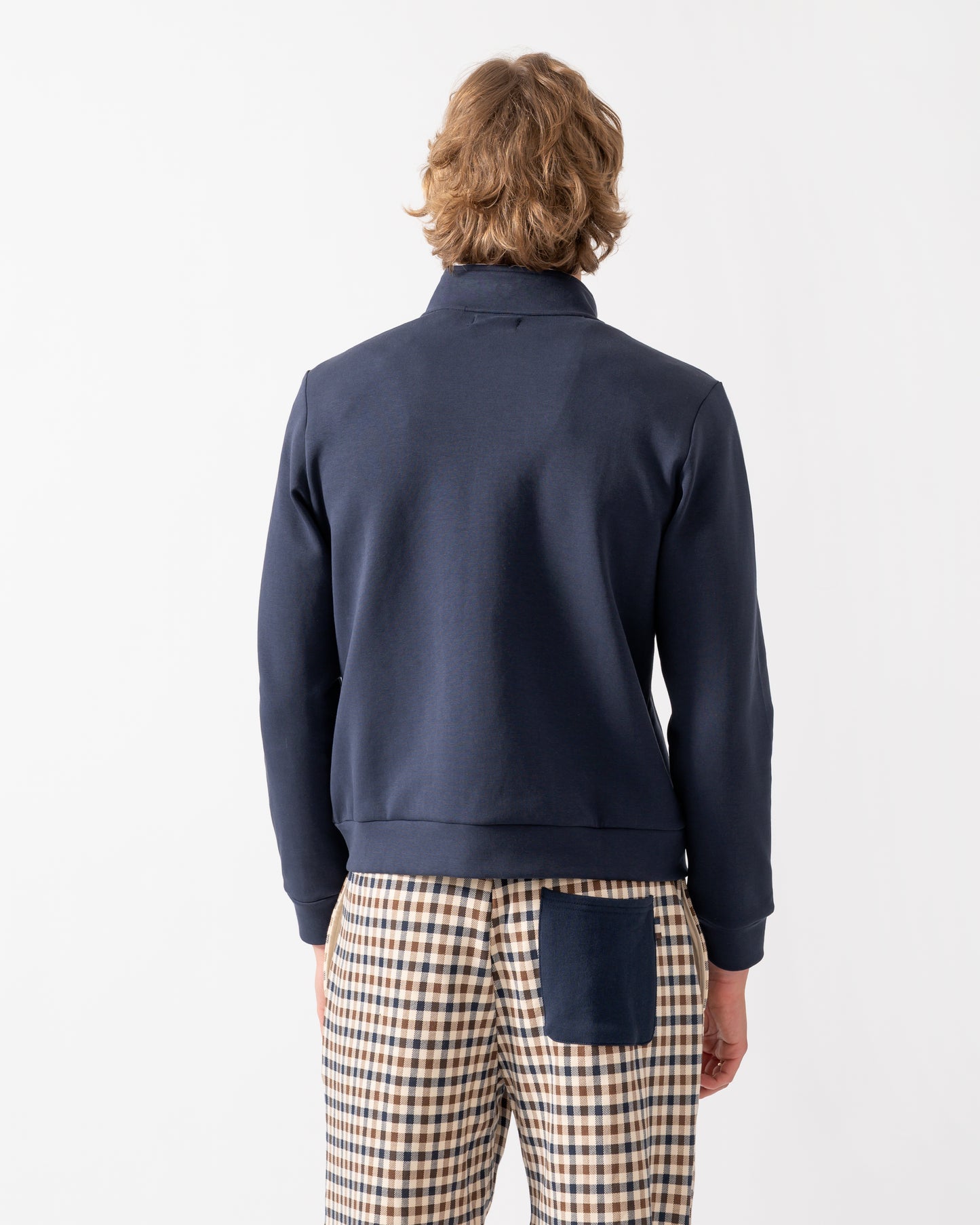 back shot of a model wearing Aquascutum Mens Scuba Piping Track Top in Navy 11