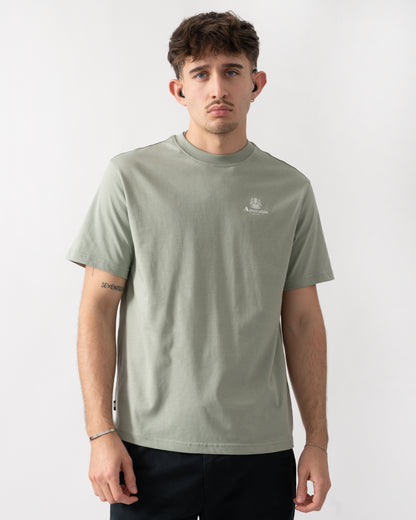 Studio shot of a model wearing a Aquascutum Mens Small Logo T-Shirt in Salvia 34