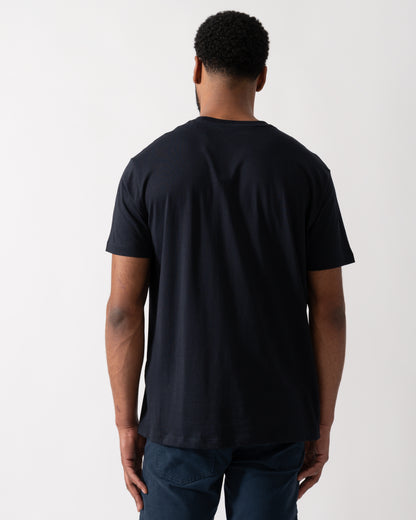 back shot of a model wearing an Armani Exchange Mens A|X Monogram T-Shirt in Deep Navy