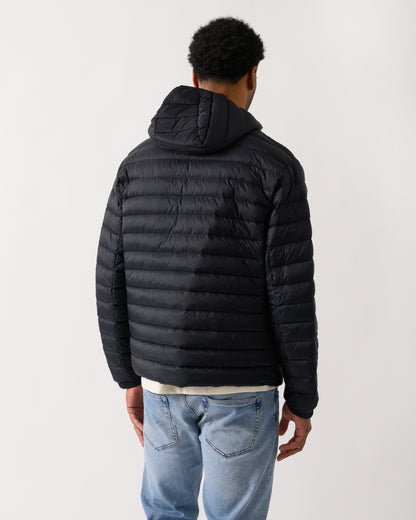 back shot of a model wearing a Armani Exchange Mens Down Jacket XM001577-AF16927 in Deep Navy UB101
