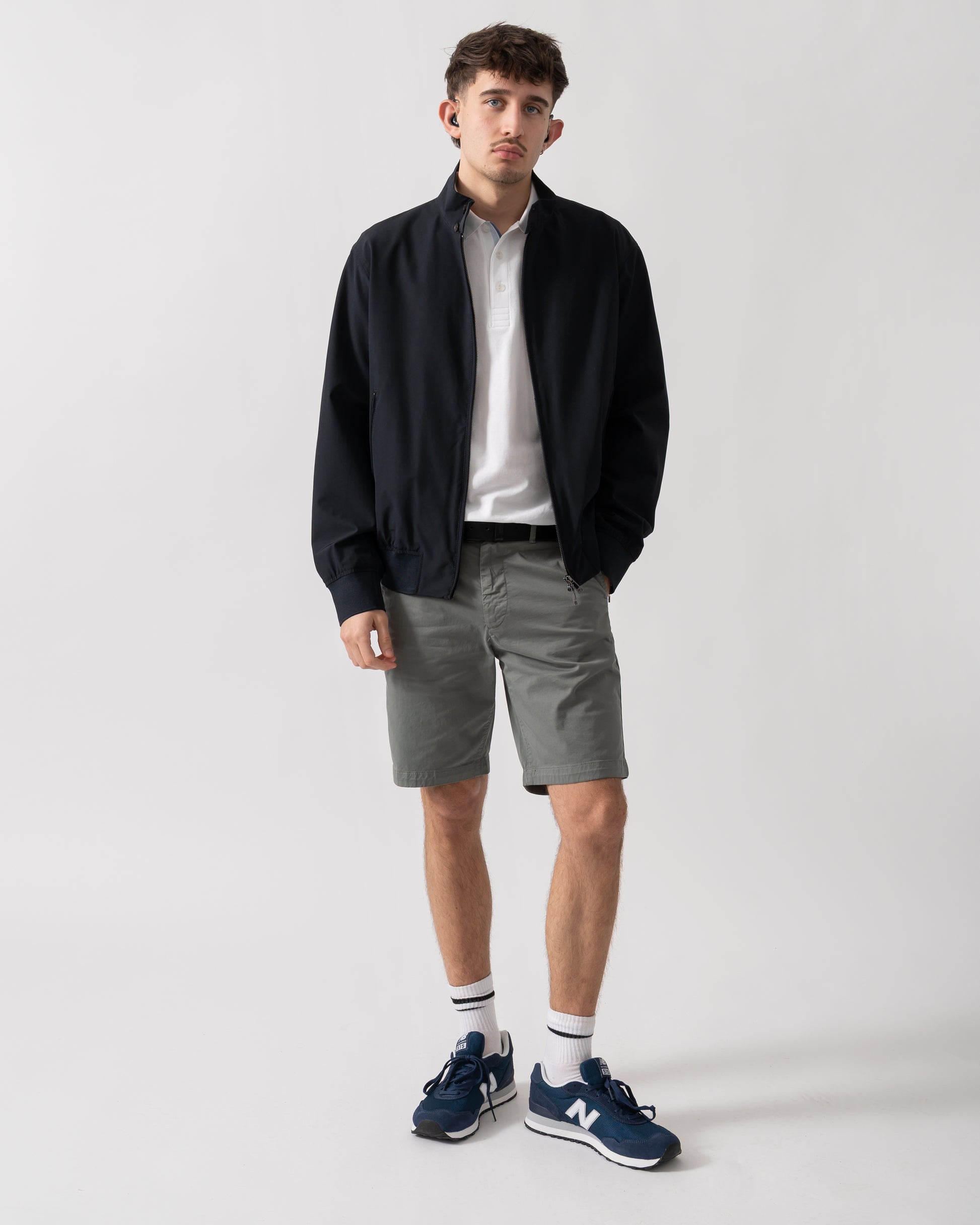 full length shot of a model wearing an Armani Exchange Mens Jacket XM002139-AF22536 in Deep Navy UB101