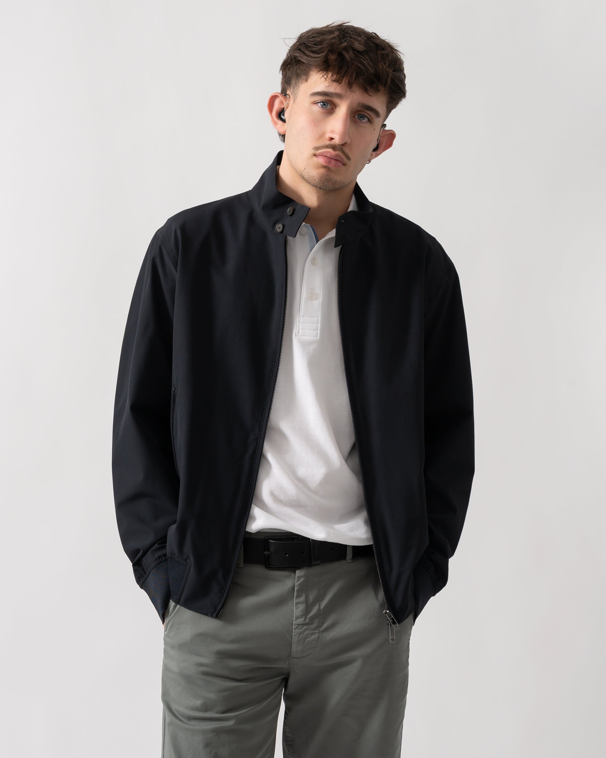 studio shot of a model wearing an Armani Exchange Mens Jacket XM002139-AF22536 in Deep Navy UB101