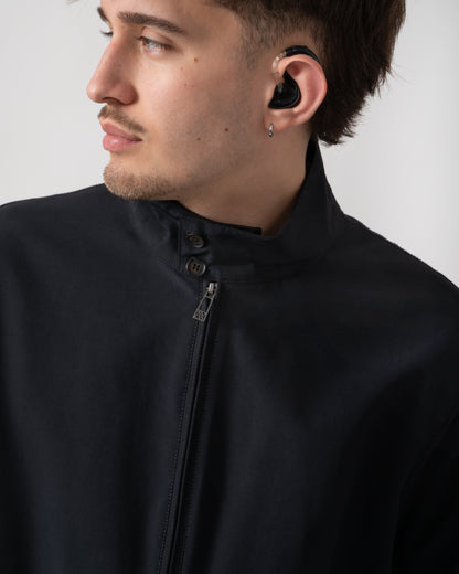 close up shot of a model wearing an Armani Exchange Mens Jacket XM002139-AF22536 in Deep Navy UB101
