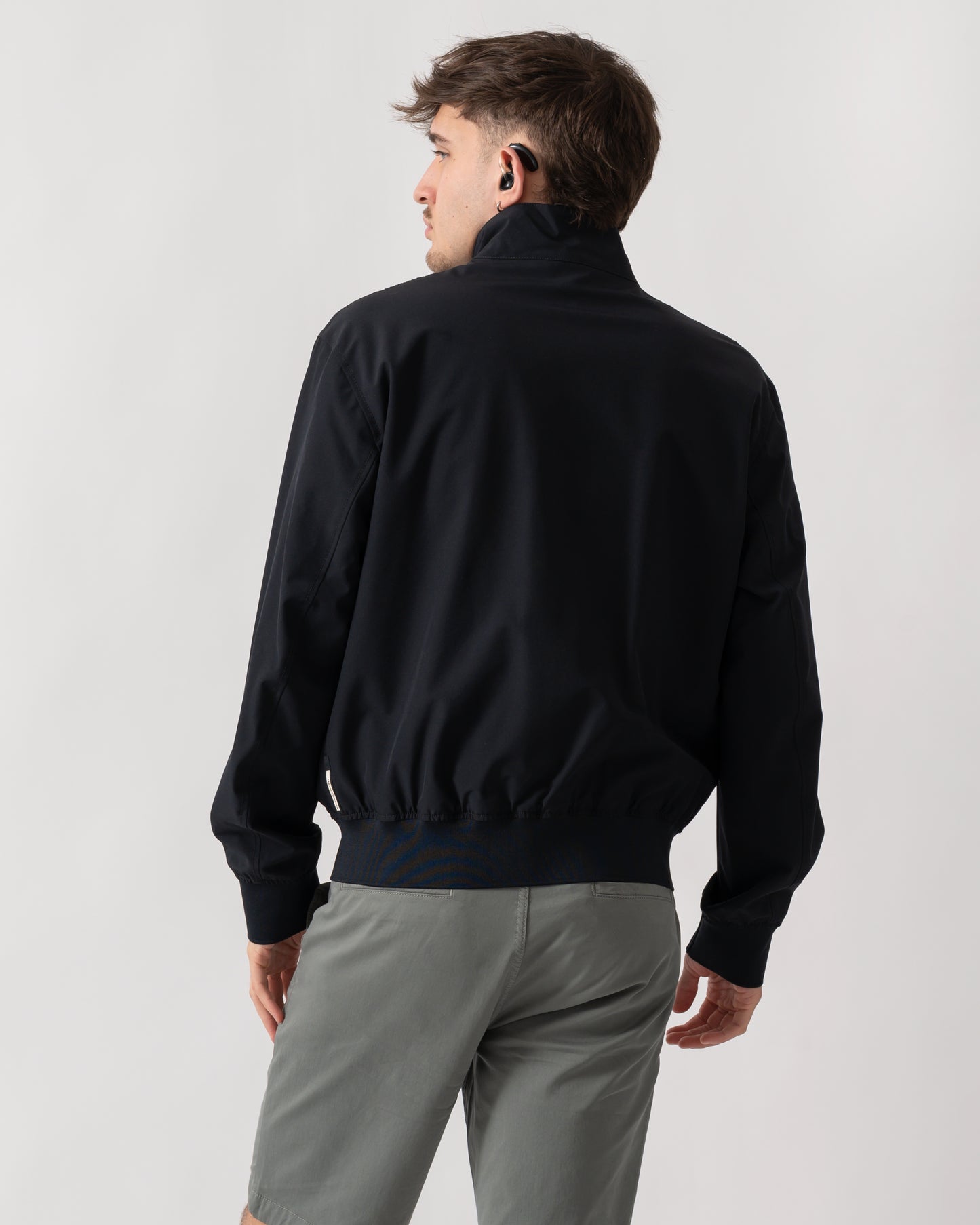 back shot of a model wearing an Armani Exchange Mens Jacket XM002139-AF22536 in Deep Navy UB101
