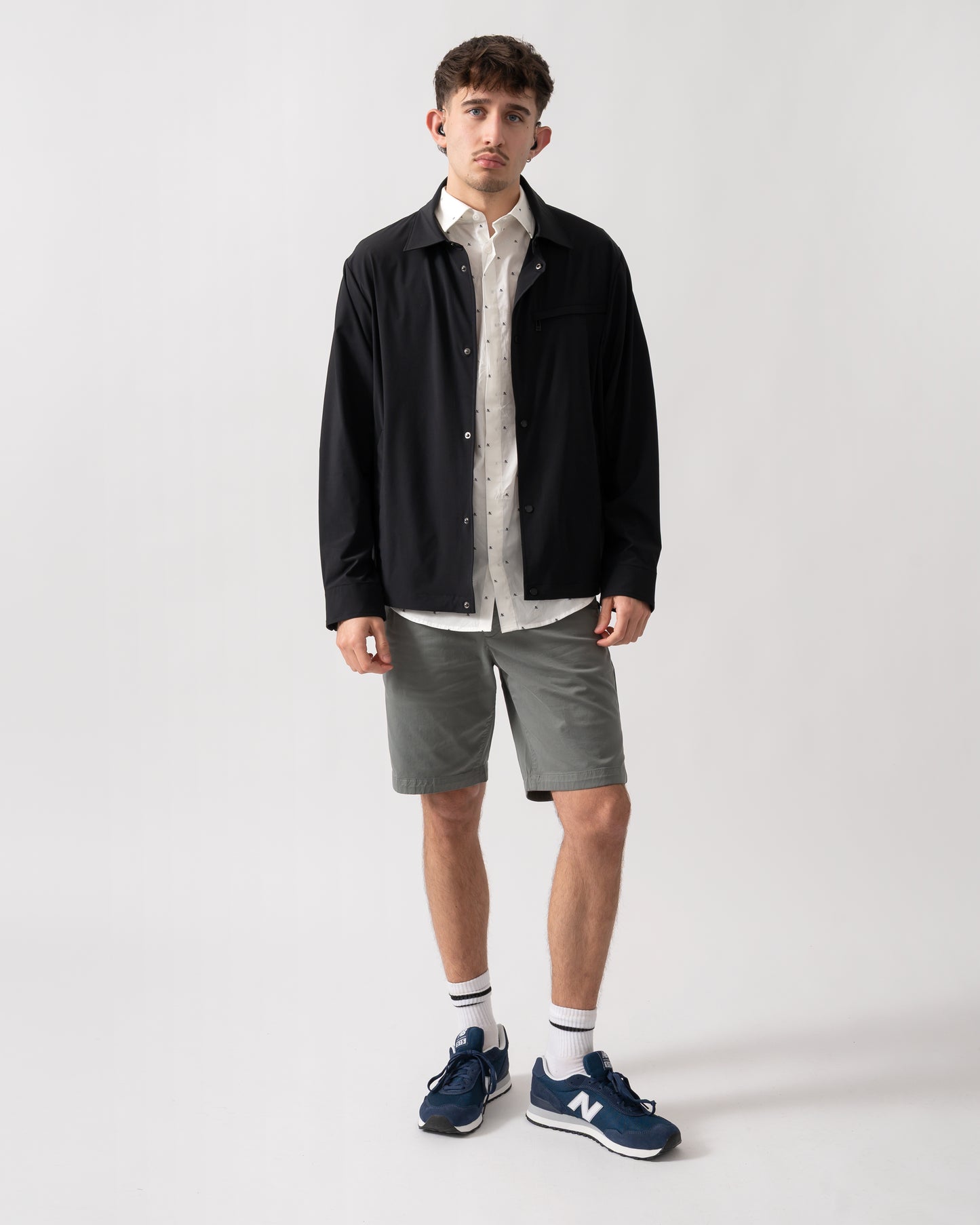 full length shot of a model wearing an Armani Exchange Mens Jacket XM002818-AF22572 in Black UC001