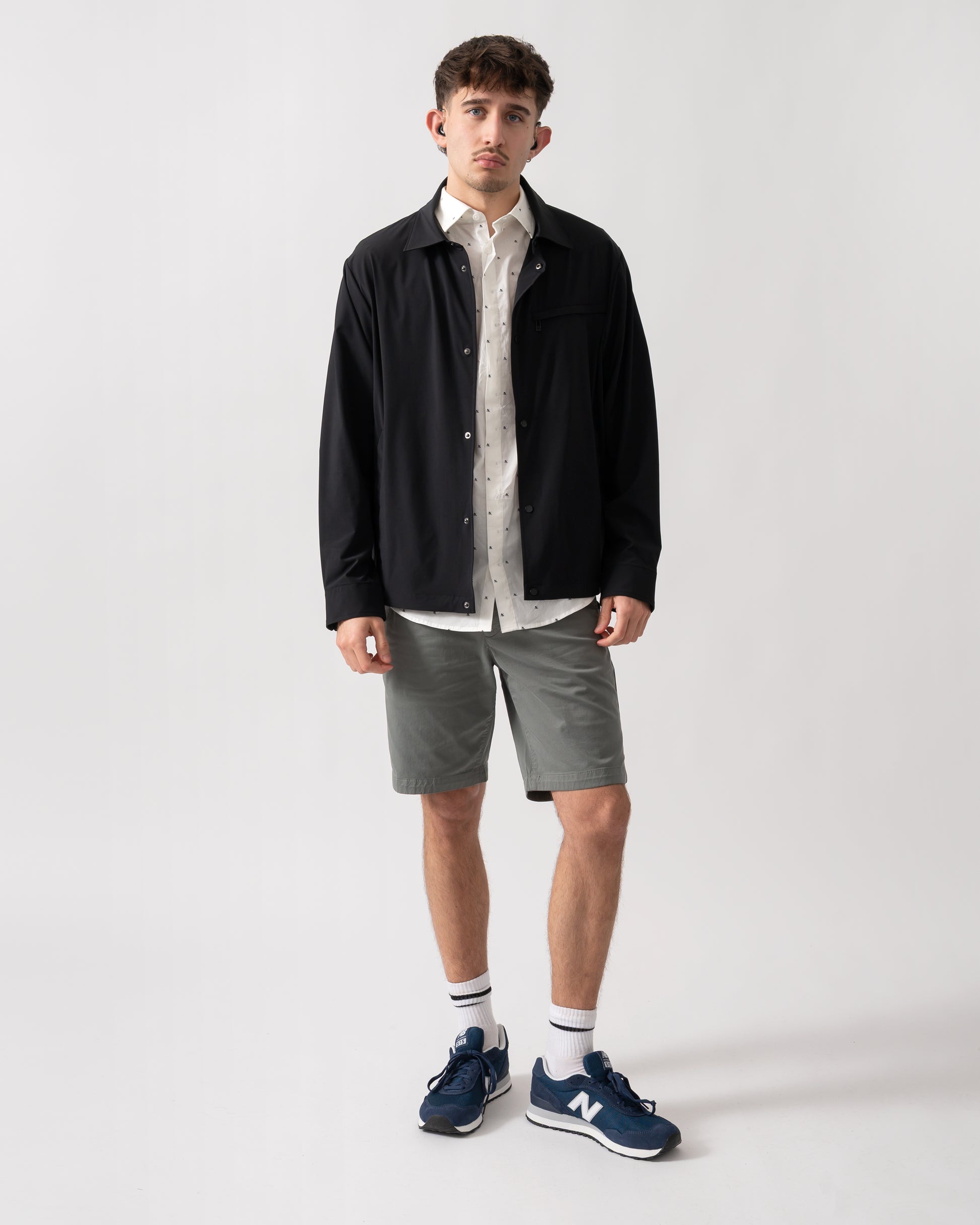 full length shot of a model wearing an Armani Exchange Mens Jacket XM002818-AF22572 in Black UC001