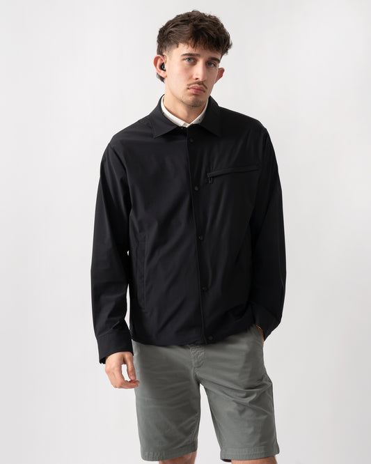 studio shot of a model wearing an Armani Exchange Mens Jacket XM002818-AF22572 in Black UC001