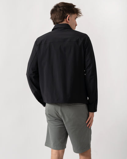 back shot of a model wearing an Armani Exchange Mens Jacket XM002818-AF22572 in Black UC001