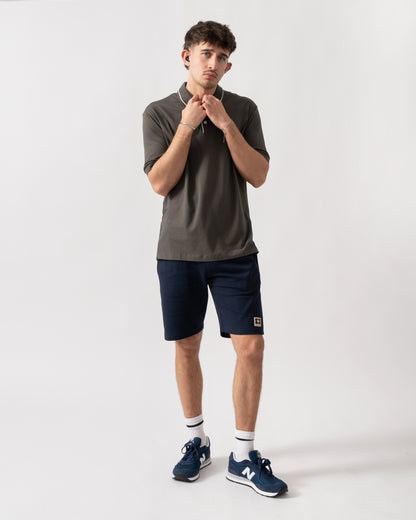 full length shot of a model wearing an Armani Exchange Mens Milano/New York Polo Shirt with Contrast Tipping in Chimera M8317