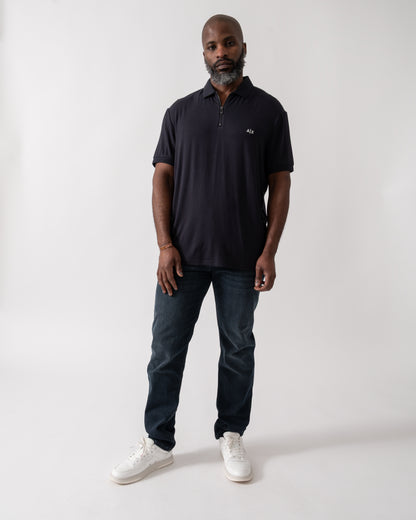 Full length of a Model wearing an Armani Exchange Mens Polo Shirt in Deep Navy