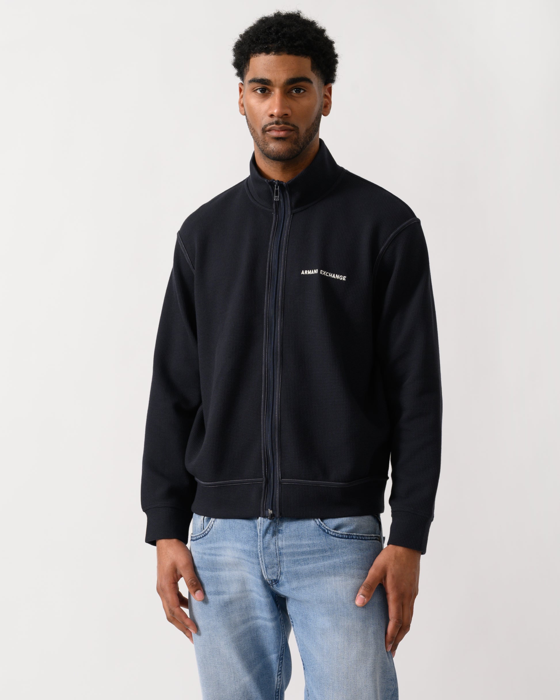 model wearing a Armani Exchange Mens Sweatshirt XM002327-AF21870 - Deep Navy UB101