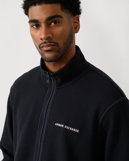 close up shot of a model wearing a Armani Exchange Mens Sweatshirt XM002327-AF21870 - Deep Navy UB101