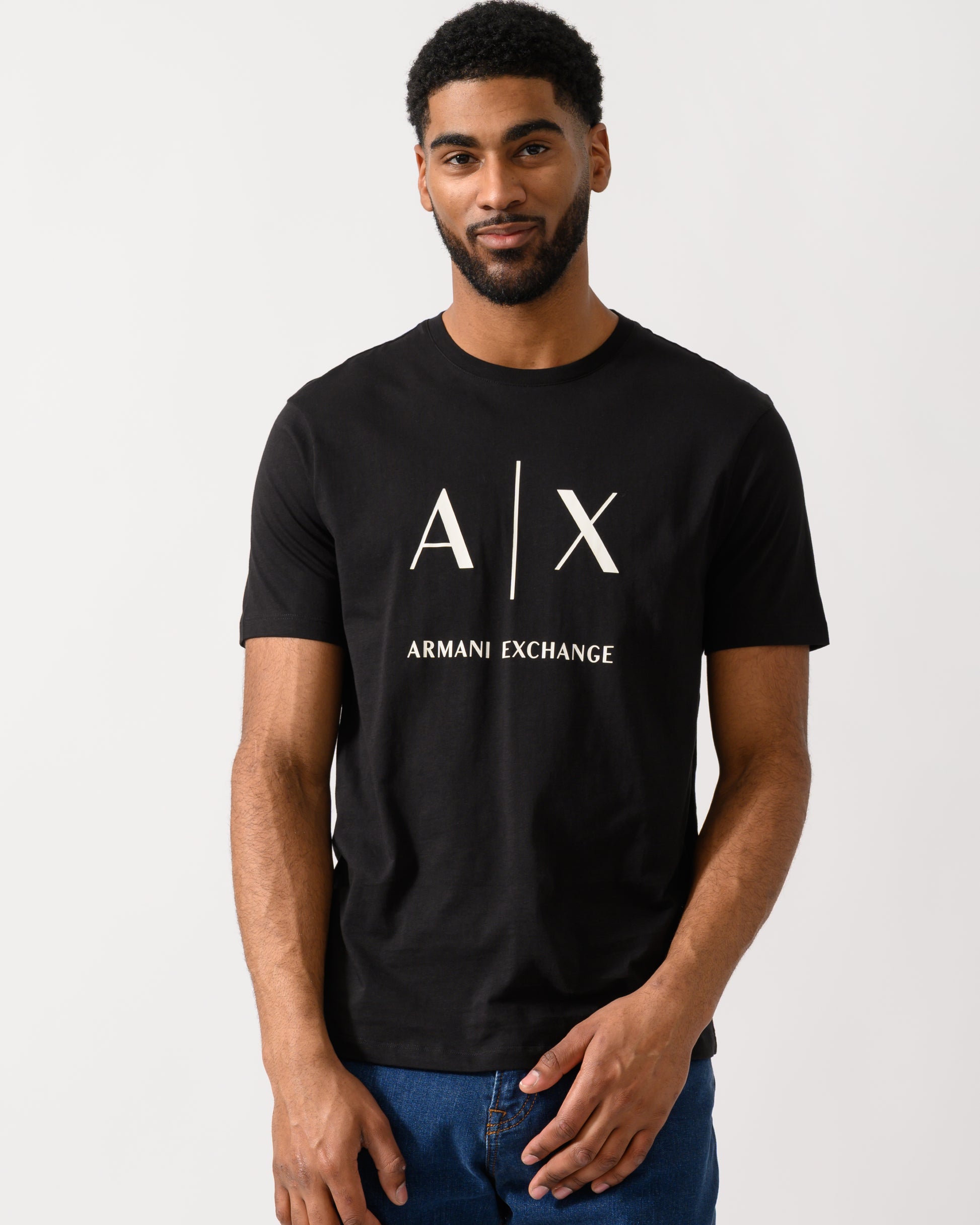 Model wearing a Armani Exchange Mens T-Shirt in Black