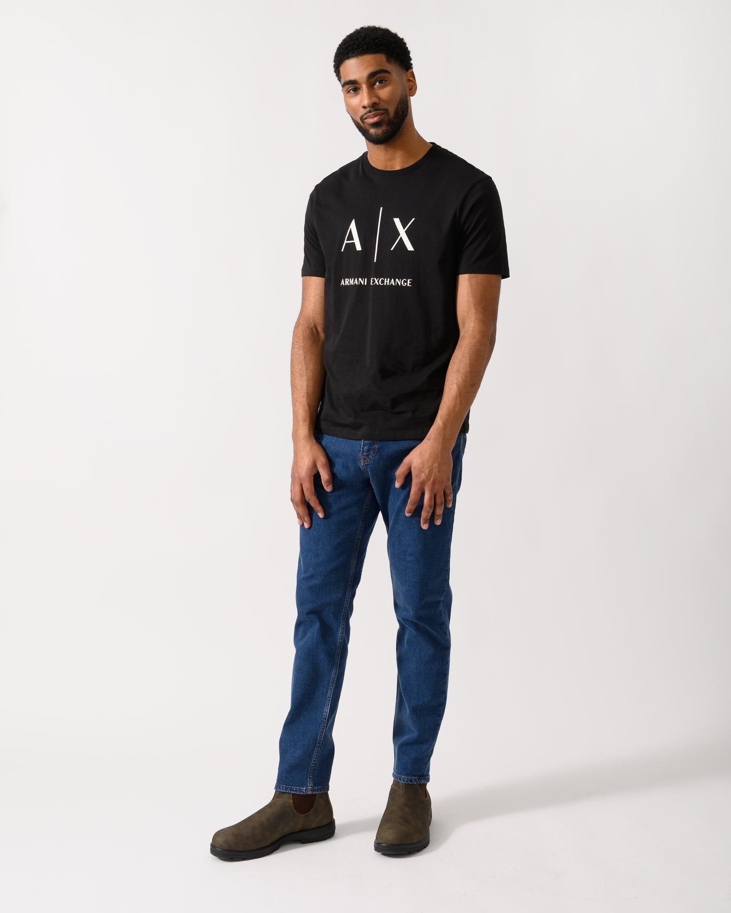 Full length shot of a Model wearing a Armani Exchange Mens T-Shirt in Black