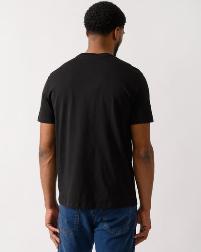Back shot of a Model wearing a Armani Exchange Mens T-Shirt in Black