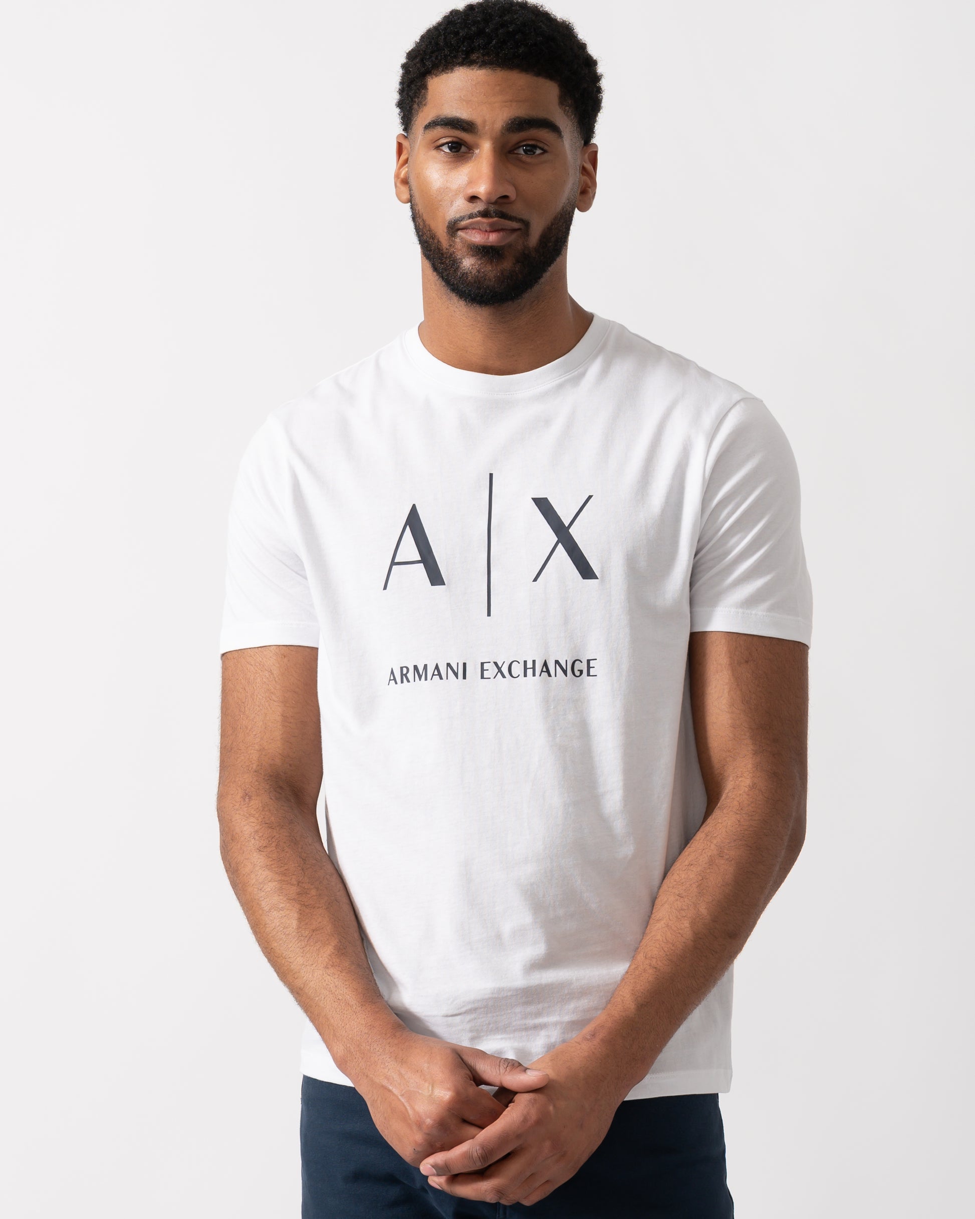 Model wearing an Armani Exchange Mens T-Shirt in White