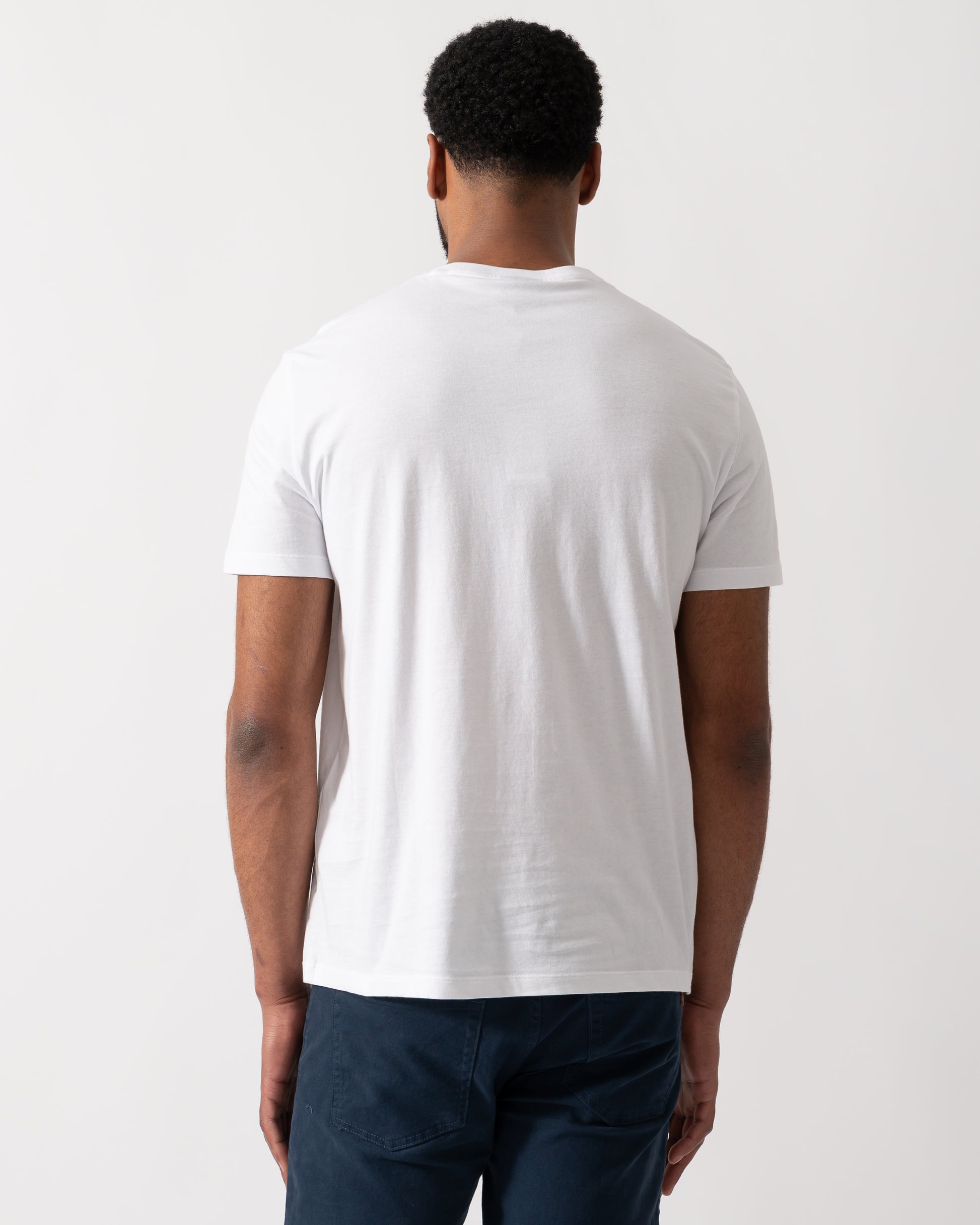 back shot of a Model wearing an Armani Exchange Mens T-Shirt in White