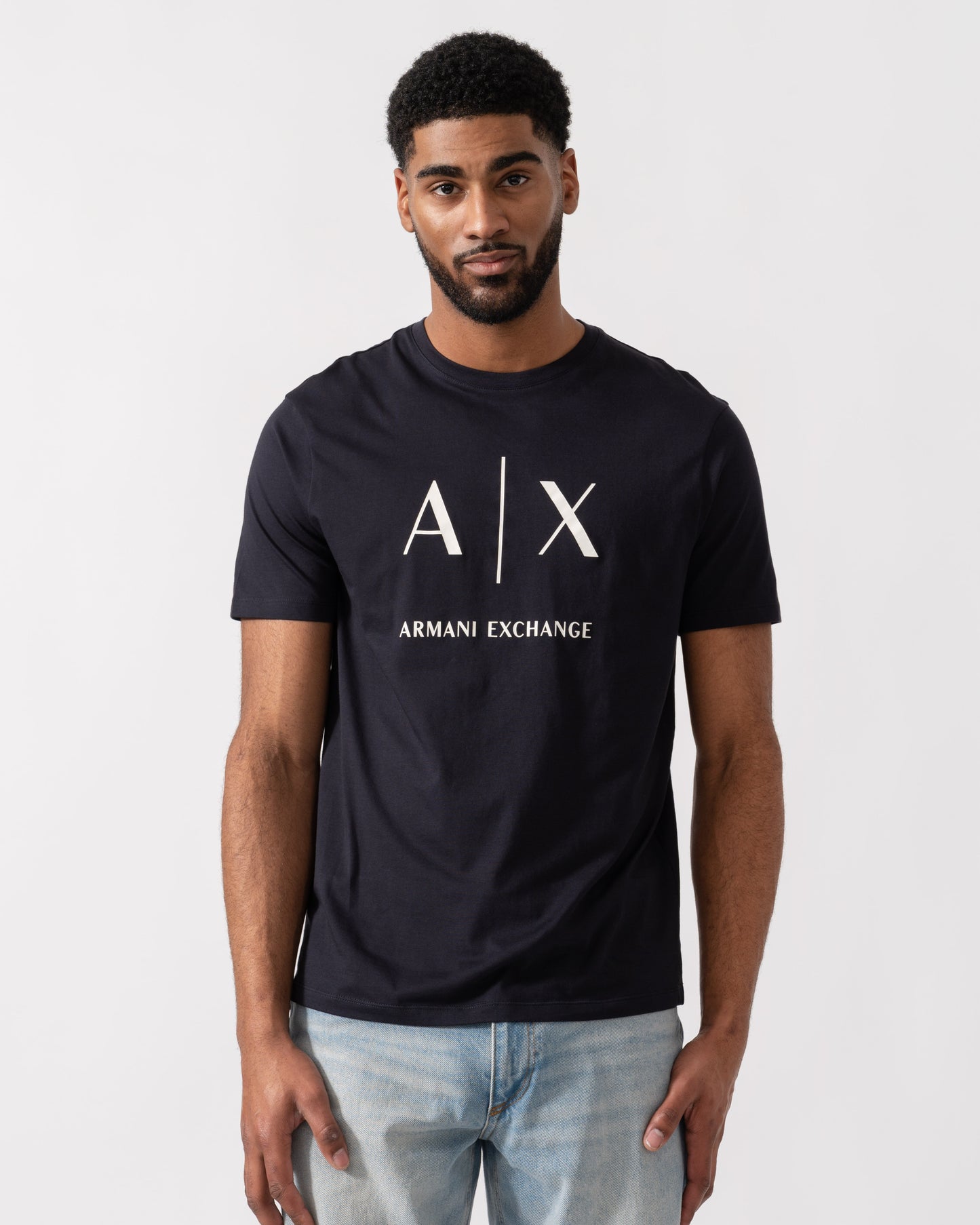 Model wearing Armani Exchange AX Logo T-Shirt in Deep Navy UB101 - Main