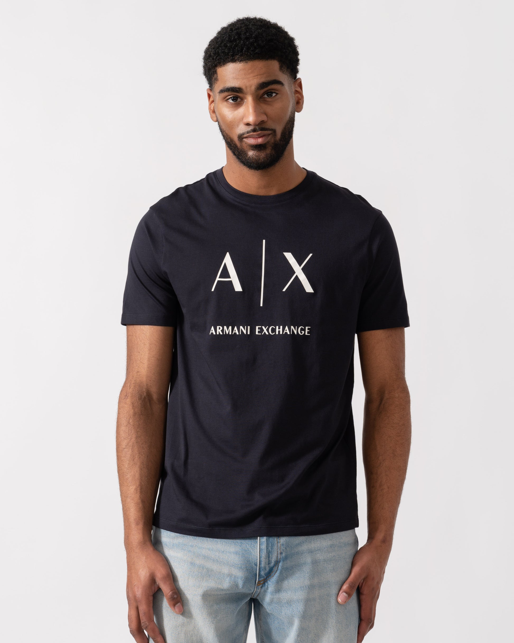 Model wearing Armani Exchange AX Logo T-Shirt in Deep Navy UB101 - Main