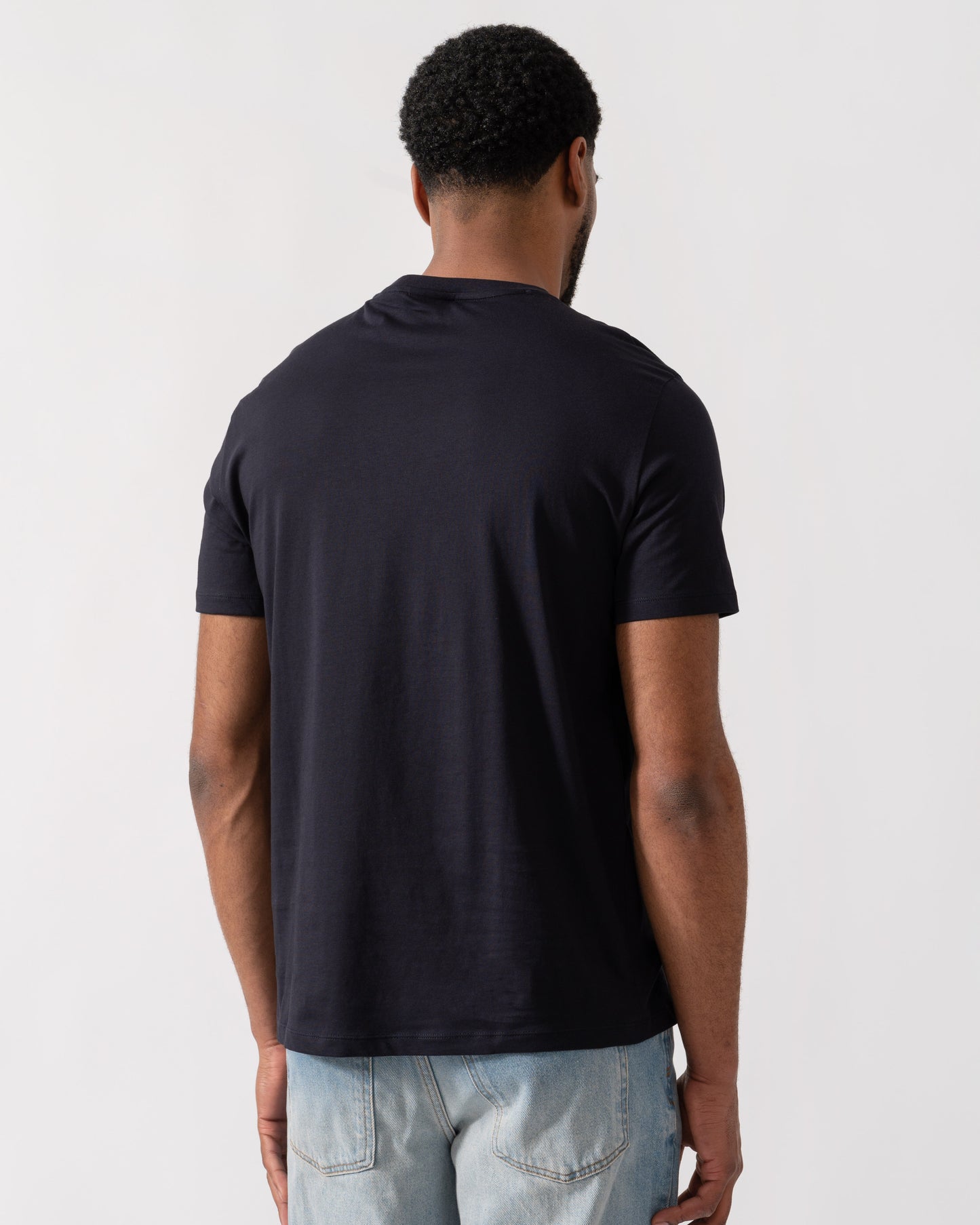 Model wearing Armani Exchange AX Logo T-Shirt in Deep Navy UB101 - back