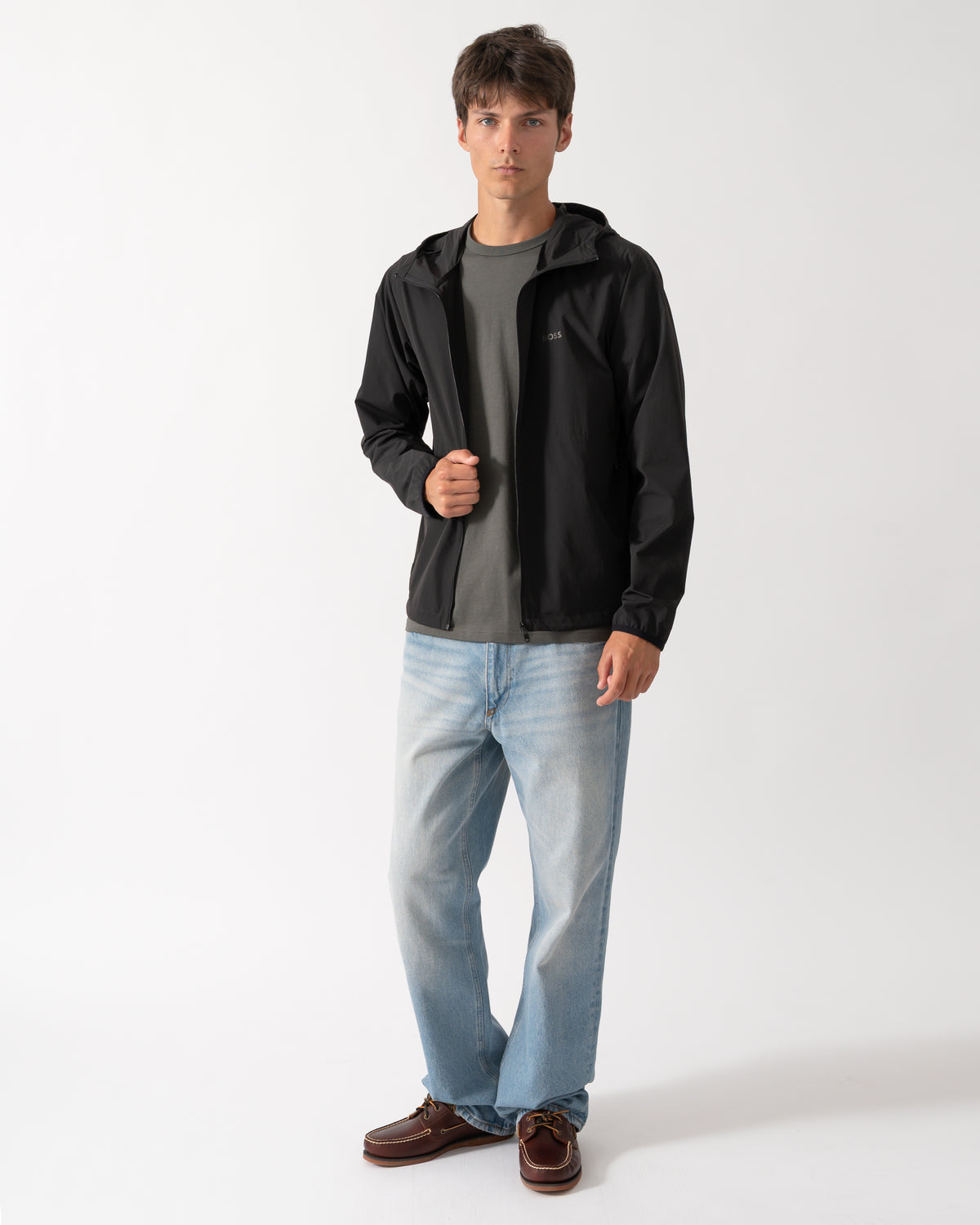 full length of a model wearing a BOSS Green Airynix Mens Hooded Jacket in Black 001