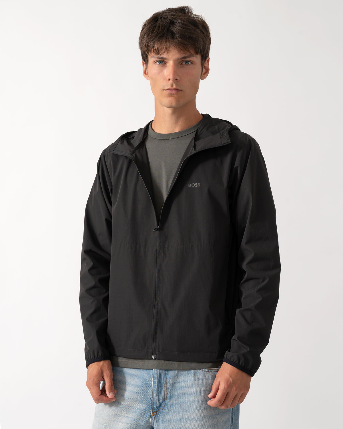 model wearing a BOSS Green Airynix Mens Hooded Jacket in Black 001