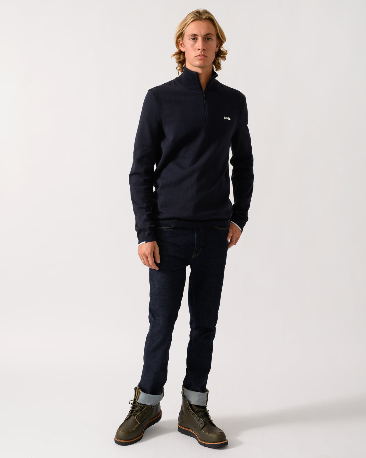 full length of a model wearing a BOSS Green Ever-X Mens Cotton sweater with quarter zip in Dark Blue 402