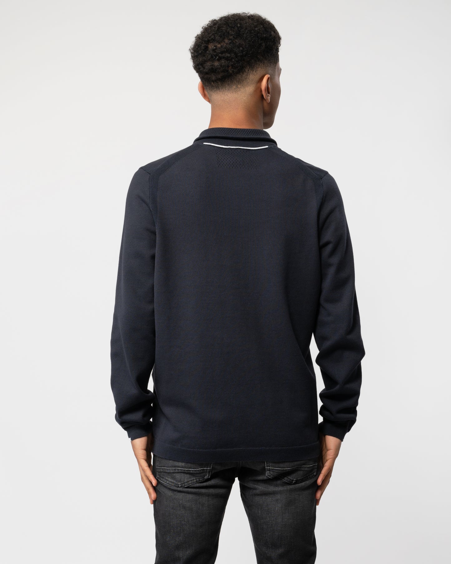 Back shot of a Model wearing a BOSS Green Ever-X Mens Cotton Blend Zip-Neck Sweater with Logo Print in Dark Blue