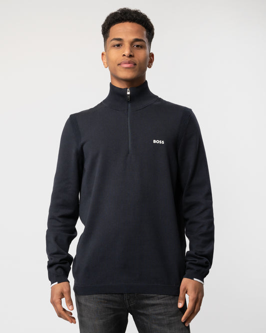 Model wearing a BOSS Green Ever-X Mens Cotton Blend Zip-Neck Sweater with Logo Print in Dark Blue