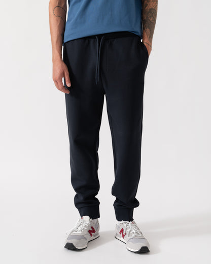 Front of the BOSS Green Hadiko Mens Stretch-cotton track pants with puff-print logo - Dark Blue 402