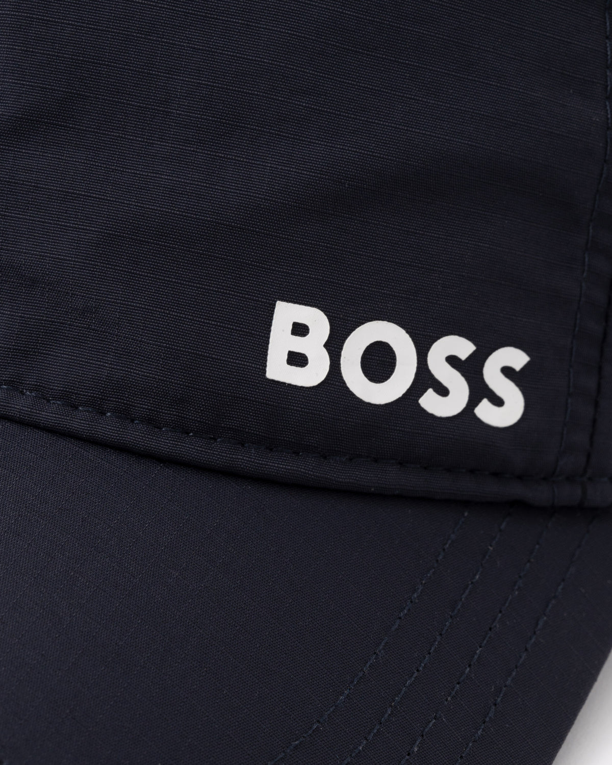 Close up on the BOSS Green Lach Mens Cap with UV Protection - Dark Blue 402