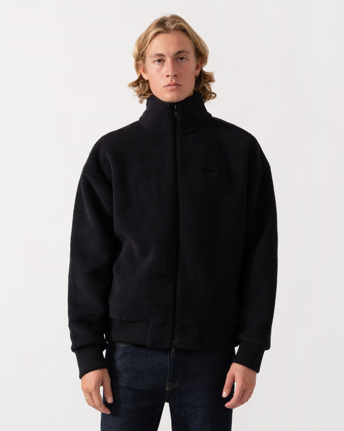 Front shot of the BOSS Green Mens  Logo-embroidered zip-up sweatshirt in teddy fleece - Black 001