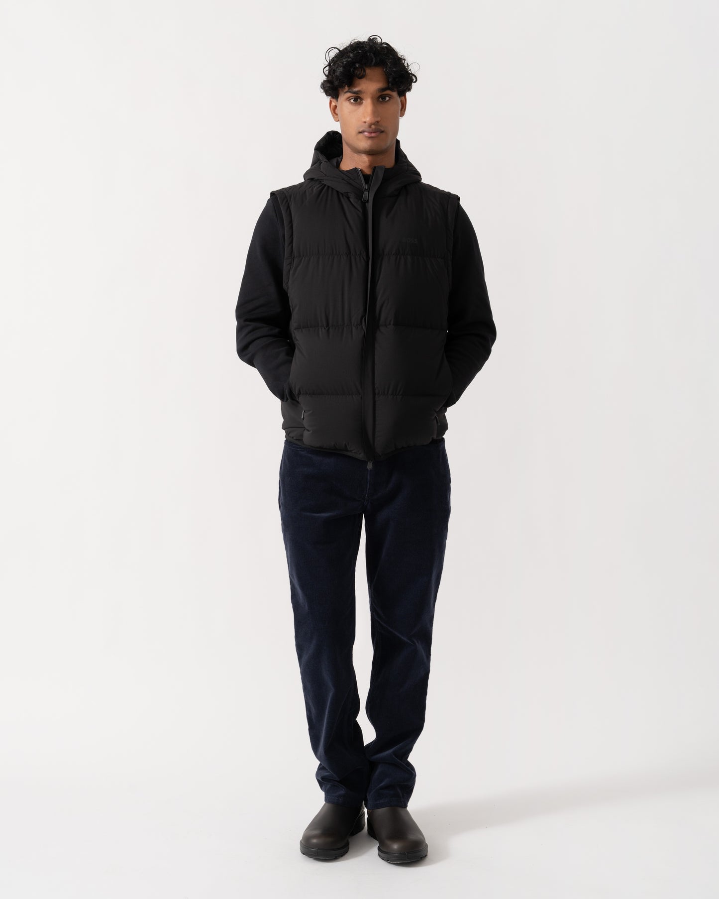 Man wearing BOSS Green OW Riplite Mens Padded Gilet - Black 001