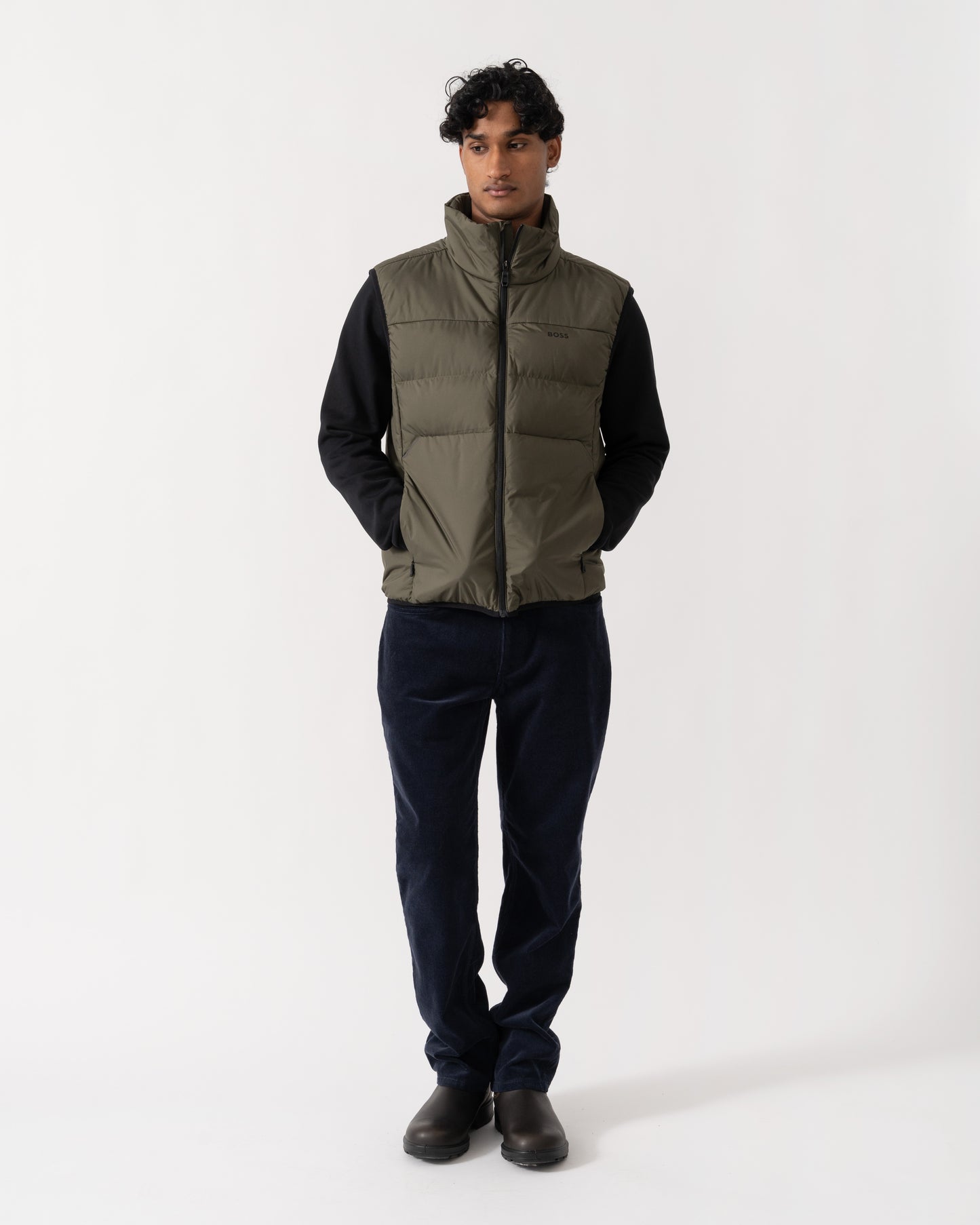 Man wearing BOSS Green OW Urbanex Mens Puffer Gilet - Open Green 398