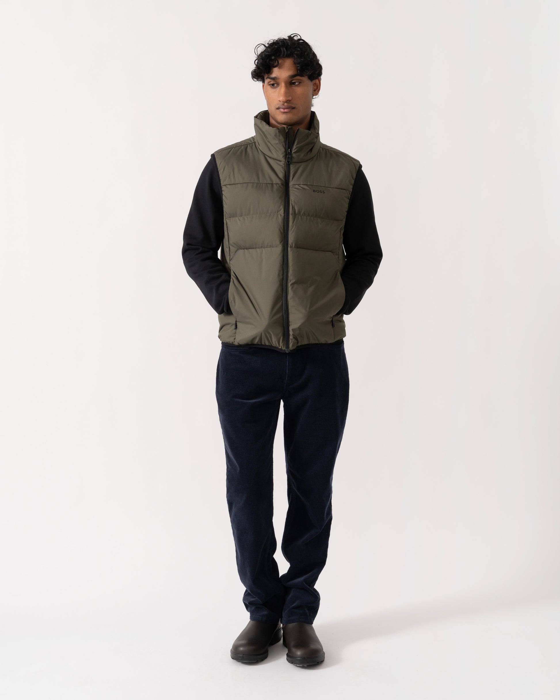 Man wearing BOSS Green OW Urbanex Mens Puffer Gilet - Open Green 398