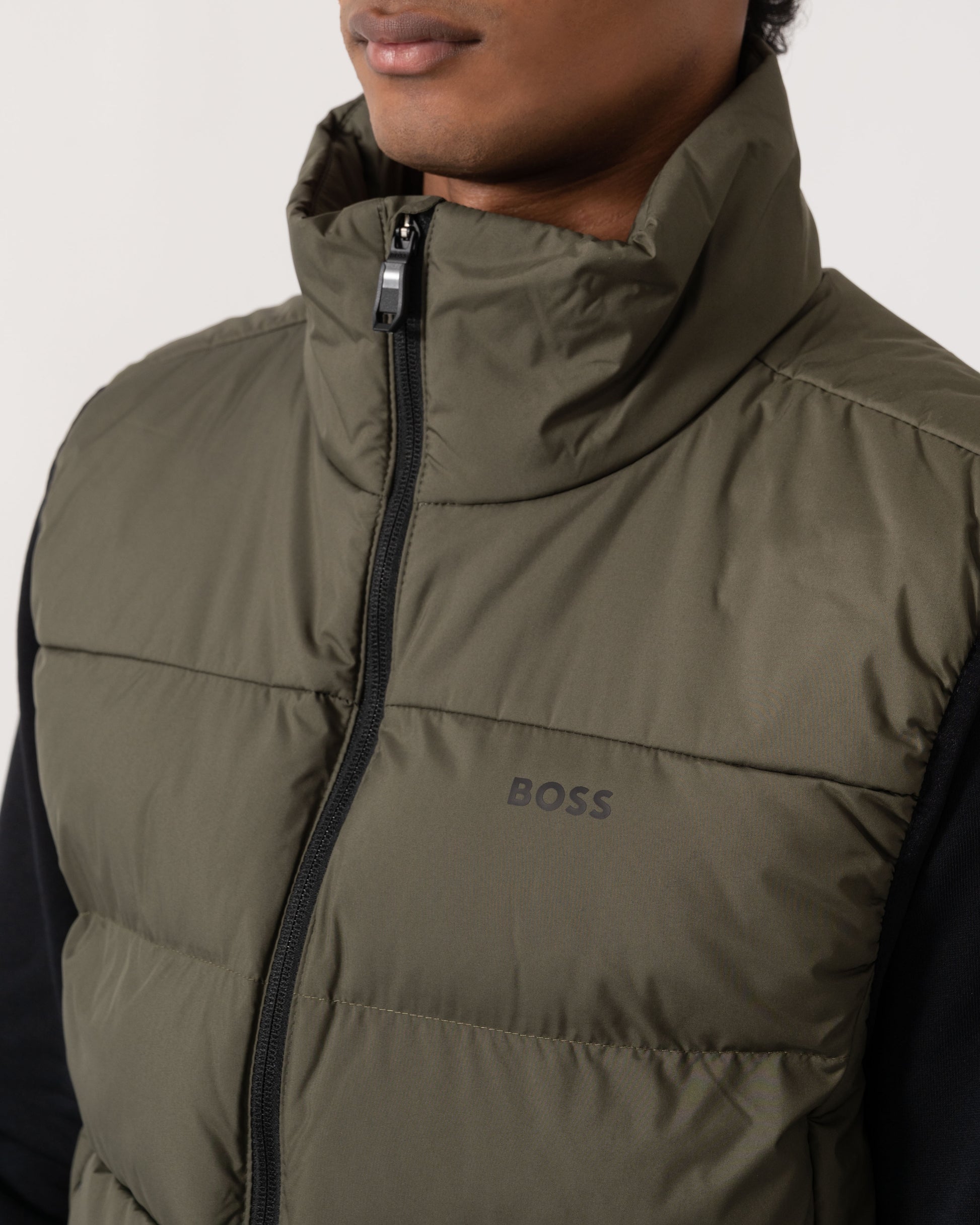 Close up of BOSS Green OW Urbanex Mens Puffer Gilet - Open Green 398