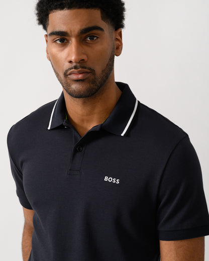 close up shot of a Model wearing a BOSS Green Paddy Mens Slim-Fit Polo Shirt in Interlock Cotton in Dark Blue 402