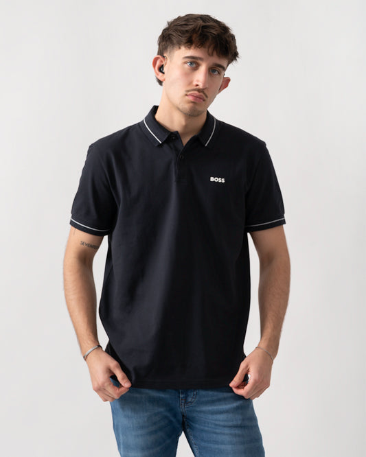 studio shot of a model wearing a BOSS Green PL_Member Mens Short Sleeve Polo Shirt in Dark Blue 402