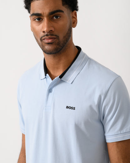 close up shot of a Model wearing a BOSS Green PL_Member Mens Short Sleeve Polo Shirt in Open Blue 460