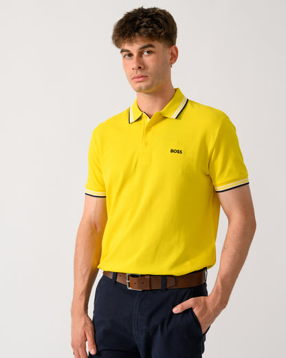 detail shot of a model wearing a BOSS Green Paddy Mens Cotton-Piqué Polo Shirt with Contrast Logo in Bright Yellow 739